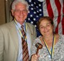 President Denny Lanctot handing over the gavel to incoming President Michele Fina